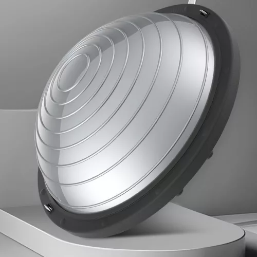 Bosu labda a sebességképzettséghez, egy félkör alakú egyensúlyozó jóga labda fitneszhez és pilateshez. szürke